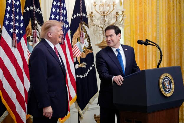 President Donald Trump looks on as Secretary of State Marco Rubio speaks during a Hispanic Heritage Month Celebration in the East Room of the White House in Washington, DC on Wednesday, September 30, 2026.  WASP20260930113 YurixGripas