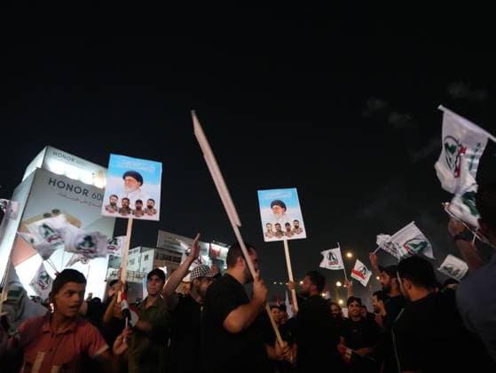 September 30, 2026, Baghdad, Iraq: BAGHDAD, IRAQ, SEPTEMBER 30, 2026: Iraqis and members of the country s security forces gather at Tahrir Square in Baghdad during celebrations marking National Sovereignty Day following the completion of the withdrawal of US forces and the end of the US-led coalition s military mission in Iraq. Participants waved Iraqi flags and security forces took part in commemorative events as the country marked the end of the coalition s military presence. Baghdad Iraq - ZUMAq101 20260930_zna_q101_165 Copyright: xMuntazerxUdayxSahibx