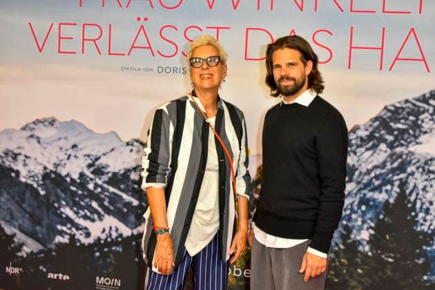 ABB FRAUWINKLER- Doris Doerrie Regisseurin Josef Ellers auf dem roten Teppich bei der NRW Kino Film Premiere Frau Winkler verlaesst das Haus im Kino Lichtburg in Essen am 30.09.2026 NRW Deutschland