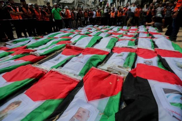 RECORD DATE NOT STATED Funeral Held for Palestinians Killed in Israel-Hamas War (INT) Funeral Held for Palestinians Killed in Israel-Hamas War. October 1, 2026, Gaza, Palestine: A mass funeral is held for 105 Palestinians who were killed in Israeli strikes during the early stages of the Israel-Hamas war. The remains of the victims were recently recovered from beneath the rubble of buildings destroyed in the Al-Taj area of Gaza City. Families and mourners gather to pay their respects. Credit: Hashem Zimmo TheNews2(Foto: Hashem Zimmo Thenews2 imago images) Funeral Held for Palestinians Killed in Israel-Hamas War  Copyright: xHashemxZimmox