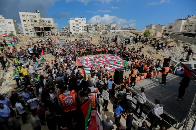 RECORD DATE NOT STATED Funeral Held for Palestinians Killed in Israel-Hamas War (INT) Funeral Held for Palestinians Killed in Israel-Hamas War. October 1, 2026, Gaza, Palestine: A mass funeral is held for 105 Palestinians who were killed in Israeli strikes during the early stages of the Israel-Hamas war. The remains of the victims were recently recovered from beneath the rubble of buildings destroyed in the Al-Taj area of Gaza City. Families and mourners gather to pay their respects. Credit: Hashem Zimmo TheNews2(Foto: Hashem Zimmo Thenews2 imago images) Funeral Held for Palestinians Killed in Israel-Hamas War  Copyright: xHashemxZimmox