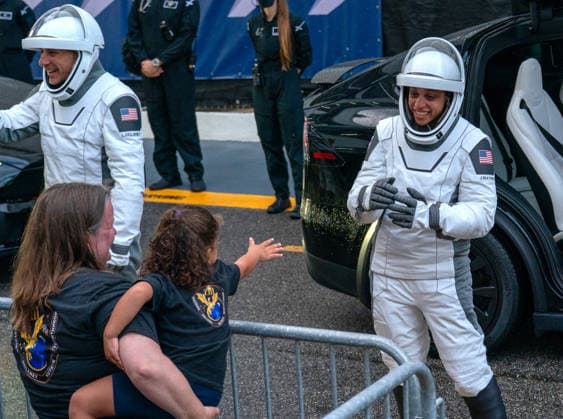 NASA s Crew-13 Astronaut Jessica Watkins, commander, waves to friends during the walkout of the operations building on her way to board a Dragon Spacecraft atop a SpaceX Falcon 9 rocket on SLC-40 at Kennedy Space Center, Florida on Thursday, October 1, 2026. Crew-13 are on their way to the International Space Station.  KSC2026100122 KATExBENIC