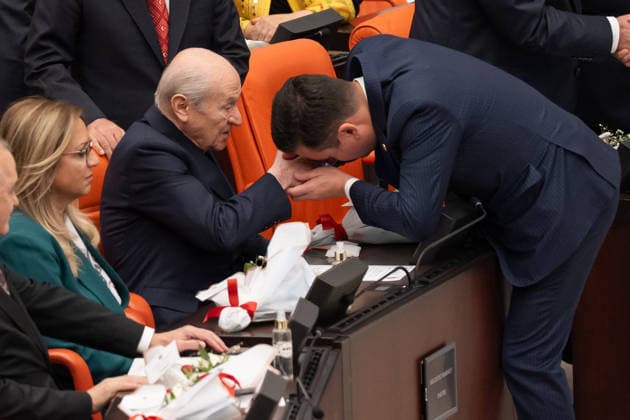 Opening Event of the 5th Legislative Year of the 28th Term of the Grand National Assembly of Turkiye ANKARA, TURKIYE - OCTOBER 1: AK Party Ankara Deputy Osman Gokcek (R) kisses the hand of MHP Chairman Devlet Bahceli (L) during the opening session of the 5th Legislative Year of the 28th Term, convened under the leadership of Speaker Numan Kurtulmus at the Grand National Assembly of Turkiye (GNAT) in Ankara, Turkiye on October 1, 2026. Ahmet Serdar Eser Anadolu Ankara Turkey. Editorial use only. Please get in touch for any other usage.  Copyright: x2026xAnadoluxAhmetxSerdarxEserx