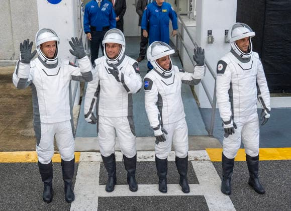 NASA s Crew-13 Astronaut Jessica Watkins, commander(2nd R), Astronaut Luke Delaney , pilot, and Mission Specialists Joshua Kutryk(L) of the Canadian Space Agency and Sergey Teteryatnikov of Roscosmos (R) walk out of the operations building on their way to board as Dragon Spacecraft atop a SpaceX Falcon 9 rocket on SLC-40 at Kennedy Space Center, Florida on Thursday, October 1, 2026. They are on their way to the International Space Station.  KSC2026100134 PATxBENIC