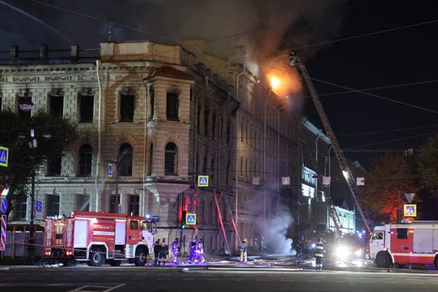 RUSSIA, ST PETERSBURG - OCTOBER 1, 2026: Fire crews battle a fire at the Miller Manions in St Isaac s Square. Valentin Yegorshin TASS  98638152