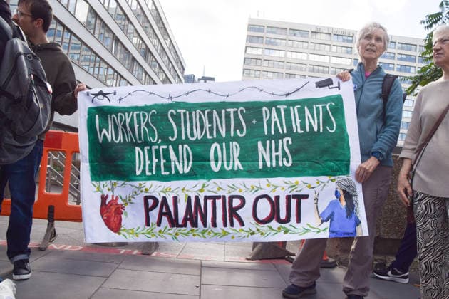 October 1, 2026, London, England, United Kingdom: Protesters gather outside St Thomas hospital calling on the UK government to keep the US tech company Palantir out of the NHS. London United Kingdom  - ZUMAv130 20261001_zip_v130_009 Copyright: xVukxValcicx