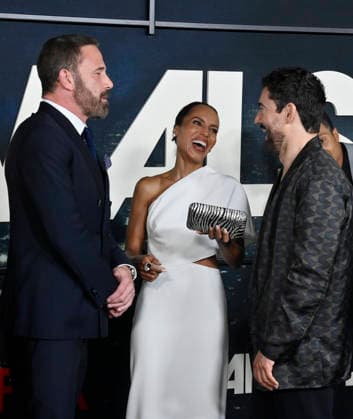 (L-R) Ben Affleck, Kerry Washington and Luis Gerardo Mendez mingle during the premiere of Netflix s political and psychological thriller Animals at the Westwood Village Theater in Los Angeles on Thursday, October 1, 2026. Storyline: Desperate to pay their son s ransom, a mayoral candidate and his wife resort to extreme measures, revealing dark secrets they never intended to bring to light.  LAP2026100143 JIMxRUYMEN