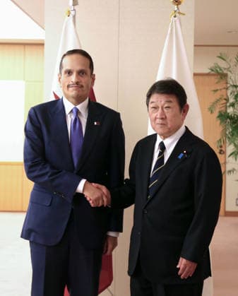 Japan-Qatar talks Japanese Foreign Minister Toshimitsu Motegi (R) shakes hands with Qatar s prime minister and foreign minister, Sheikh Mohammed bin Abdulrahman Al-Thani, before their talks at the Japanese Foreign Ministry in Tokyo on Oct. 2, 2026.  A14AA0005629740P