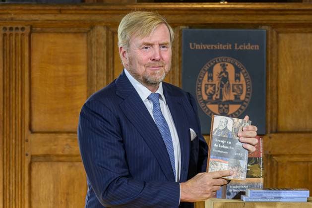 Leiden, The Netherlands, 2026-10-02 11:59:32 LEIDEN, 02-10-2026, Leiden University. King Willem Alexander receives the results of the independent research into the role of the House of Orange-Nassau in the colonial history of the Netherlands in the Academy Building of Leiden University. Principal investigator Prof. Dr. Gert Oostindie presents the King with the five books on which approximately sixty researchers have worked over the past few years, including the comprehensive popular book *Oranje en de KoloniÃ«n, 1600-2025. De kolonie geschiedenis van het Huis Oranje-Nassau*. PHOTO: NLBeeld Patrick van Emst Credit: NL Beeld Patrick van Emst  Copyright: xx x