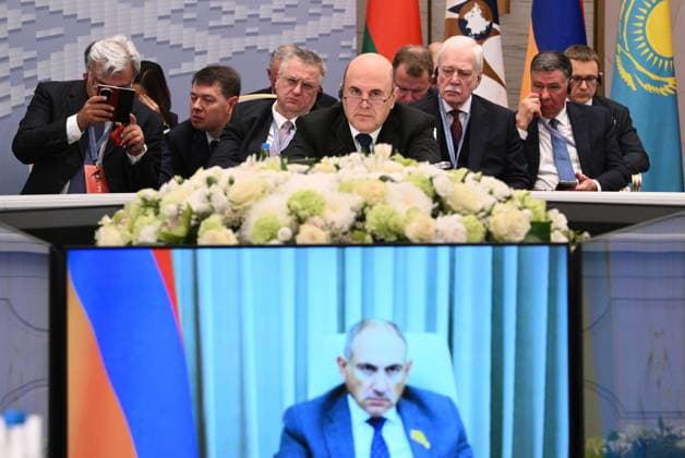 Belarus Eurasian Intergovernmental Council 9256206 02.10.2026 Russian Prime Minister Mikhail Mishustin attends an expanded format meeting of the Eurasian Intergovernmental Council, as Armenian Prime Minister Nikol Pashinyan appears on a screen via video link, in Minsk, Belarus. Kirill Zykov Sputnik Minsk Belarus  Copyright: xKirillxZykovx