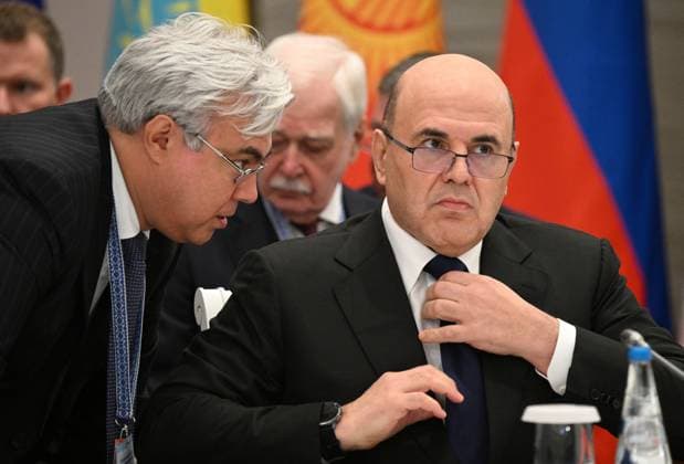 Belarus Eurasian Intergovernmental Council 9256228 02.10.2026 Russian Prime Minister Mikhail Mishustin listens to Deputy Chief of the Russian Government Staff Elmir Tagirov during an expanded format meeting of the Eurasian Intergovernmental Council in Minsk, Belarus. Kirill Zykov Sputnik Minsk Belarus  Copyright: xKirillxZykovx