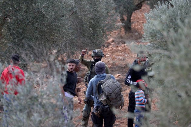 Israeli settlers intervene against Palestinians olive-picking event in Nablus town NABLUS, WEST BANK, PALESTINE - OCTOBER 02: Israeli settlers, under the protection of Israeli forces, intervene against an olive-picking event organized by Palestinians and a group of activists in the town of Beita, in Nablus, West Bank, Palestine on October 02, 2026. Issam Rimawi Anadolu Nablus West Bank. Editorial use only. Please get in touch for any other usage.  Copyright: x2026xAnadoluxIssamxRimawix