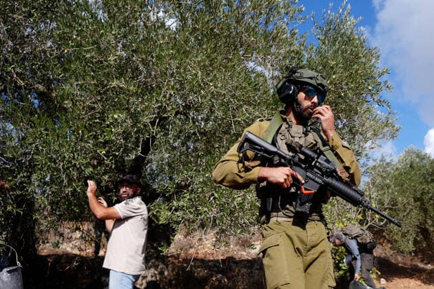 Israeli settlers intervene against Palestinians olive-picking event in Nablus town NABLUS, WEST BANK, PALESTINE - OCTOBER 02: Israeli settlers, under the protection of Israeli forces, intervene against an olive-picking event organized by Palestinians and a group of activists in the town of Beita, in Nablus, West Bank, Palestine on October 02, 2026. Issam Rimawi Anadolu Nablus West Bank. Editorial use only. Please get in touch for any other usage.  Copyright: x2026xAnadoluxIssamxRimawix