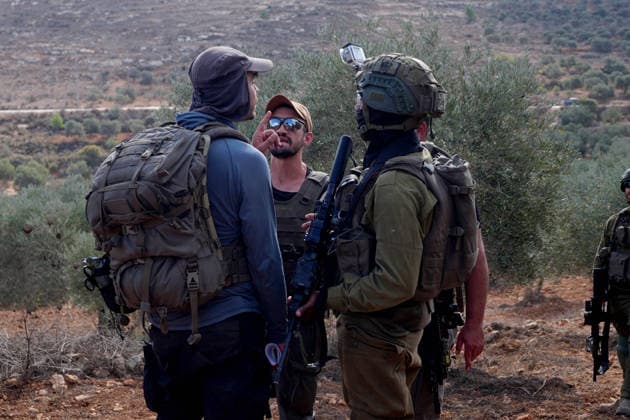 Israeli settlers intervene against Palestinians olive-picking event in Nablus town NABLUS, WEST BANK, PALESTINE - OCTOBER 02: Israeli settlers, under the protection of Israeli forces, intervene against an olive-picking event organized by Palestinians and a group of activists in the town of Beita, in Nablus, West Bank, Palestine on October 02, 2026. Issam Rimawi Anadolu Nablus West Bank. Editorial use only. Please get in touch for any other usage.  Copyright: x2026xAnadoluxIssamxRimawix