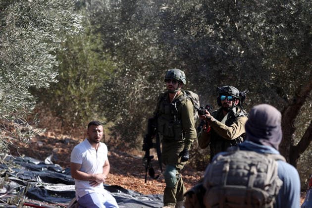 Israeli settlers intervene against Palestinians olive-picking event in Nablus town NABLUS, WEST BANK, PALESTINE - OCTOBER 02: Israeli settlers, under the protection of Israeli forces, intervene against an olive-picking event organized by Palestinians and a group of activists in the town of Beita, in Nablus, West Bank, Palestine on October 02, 2026. Issam Rimawi Anadolu Nablus West Bank. Editorial use only. Please get in touch for any other usage.  Copyright: x2026xAnadoluxIssamxRimawix