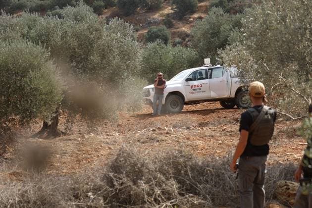 Israeli Settlers And Forces Attacked Palestinian Farmers During Olive Harvest In Beita BEITA, NABLUS, PALESTINE OCTOBER 2, 2026: Israeli settlers and Israeli forces attacked Palestinian farmers while they were picking olives in the Jabal Al-Arma area, east of Beita, south of Nablus. Settlers fired live ammunition toward the farmers, with no injuries reported. According to the Palestinian Red Crescent Society, Israeli forces also beat a 46-year-old Palestinian farmer during raids on olive farms in Beita. Witnesses told Anadolu that Israeli forces fired stun grenades and tear gas at farmers in the Jabal Al-Arma area, forcing them to leave. The olive harvest begins in early October and continues through the end of November, making it an im Copyright: x xSalmanxMohsenxAlkhatibx xJNAxPressx
