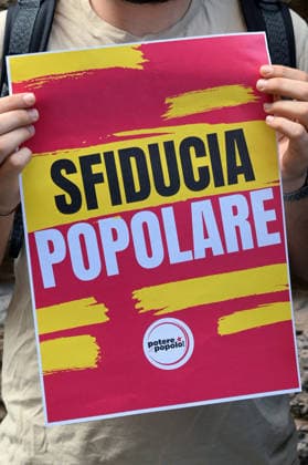 October 2, 2026, Florence, Italia, Italy: A representative of Potere al Popolo (People s Power) holds a Popular No Confidence sign in the square against the electoral law reform that requires 450,000 signatures to run in the general elections. Florence, October 2, 2026 Florence Italy  - ZUMAa289 20261002_zia_a289_094 Copyright: xAleandroxBiagiantix xAgfx