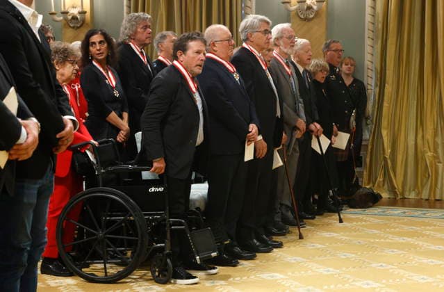 October 2, 2026, Ottawa, On, CANADA: Actor Michael J. Fox, front, stands for the national anthem with other Order of Canada recipients at the end of an investiture ceremony at Rideau Hall in Ottawa, Friday, Oct. 2, 2026. Ottawa CANADA  - ZUMAc35_ 20261002_zaf_c35_049 Copyright: xPatrickxDoylex