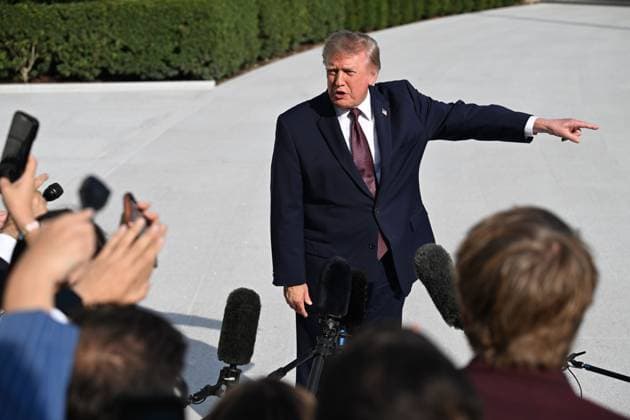 October 2, 2026, Washington, Dc, USA: U.S. President Donald Trump talks to the media before boarding Marine One on the South Lawn of the White House in Washington, DC, United States, on October 2, 2026. Washington USA  - ZUMAs197 20261002_aaa_s197_265 Copyright: xKylexMazzax