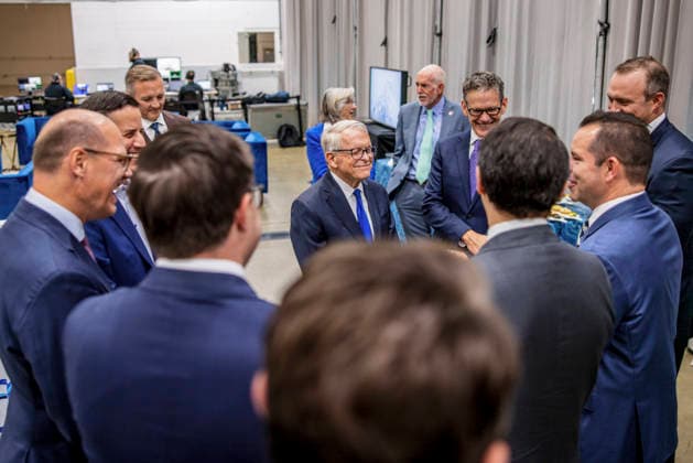 October 2, 2026, New Albany, Ohio, U.S: Ohio Governor Mike Dewine is surrounded by Bayer and Central Ohio business leaders Friday, October 2, 2026 at an event where Bayer Pharmaceuticals said it will invest .2 billion in a new pharmaceutical manufacturing campus in the New Albany International Business Park. The new manufacturing plant is slated to bring hundreds of jobs to the region. Gov. Mike DeWine said the .2 billion plant would be Bayer s first pharmaceutical manufacturing and processing plant in North America. He said it also marked Ohio s largest international healthcare project, as well as the largest German investment in state history. Ã’One of the points that we made to Bayer was our proximity to seven major research universitie - ZUMAd149 20261002_zap_d149_002 Copyright: xJamesxD.xDeCampx