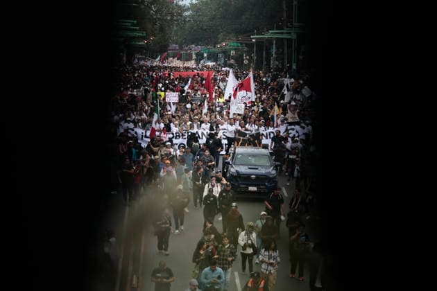 October 2, 2026, Mexico City, Cdmx, Mexico: Thousands of people carrying placards gathered at the Plaza de las Tres Culturas and the surrounding area to commemorate the 58th anniversary of the 1968 student massacre in Tlatelolco; they marched toward Mexico City s ZoÂ³calo to hold a rally in memory of those who died during the 1968 student movement. Prior to this, hundreds of students arrived at the meeting point near the Tlatelolco Metro station, where a heavy police deployment from the Secretariat of Citizen Security (SSCCDMX) was already waiting for them; these hooded officers on motorcycles boxed the students in, both inside and outside the metro facilities, to prevent their peaceful movement, sparking conflict through abuses of authori - ZUMAp204 20261002_zip_p204_082 Copyright: xJosuexPerezx
