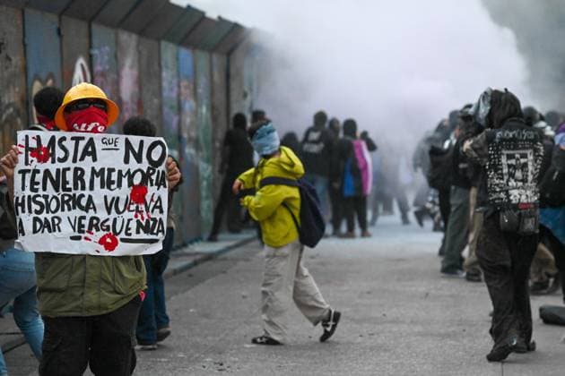 October 2, 2026: TO-45322-MEXICO , October 2, 2026. Student leaders from 1968 marched alongside students from various public universities, feminist collectives, "searching mothers," and Indigenous people from diverse regions to commemorate the anniversary of the Tlatelolco Massacre. They chanted slogans such as "No forgiveness, no forgetting," "Death to the State," and "It was the military." They marched along various avenues in the Mexican capital, concluding their rally at the Z& xf3;calo plaza, where clashes broke out with police stationed behind the barriers guarding the National Palace. In Mexico City. Clasos.com.mx - ZUMAcs4_ 20261002_faa_cs4_215 Copyright: xJavierxLiraxOterox