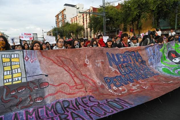 October 2, 2026: TO-45322-MEXICO , October 2, 2026. Student leaders from 1968 marched alongside students from various public universities, feminist collectives, "searching mothers," and Indigenous people from diverse regions to commemorate the anniversary of the Tlatelolco Massacre. They chanted slogans such as "No forgiveness, no forgetting," "Death to the State," and "It was the military." They marched along various avenues in the Mexican capital, concluding their rally at the Z& xf3;calo plaza, where clashes broke out with police stationed behind the barriers guarding the National Palace. In Mexico City. Clasos.com.mx - ZUMAcs4_ 20261002_faa_cs4_174 Copyright: xJavierxLiraxOterox