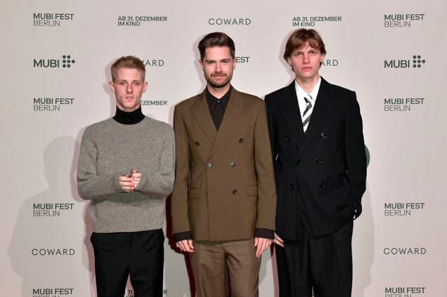 Valentin Campagne, Lukas Dhont und Emmanuel Macchia bei der Premiere des Kinofilms Coward im silent green Kulturquartier. Berlin, 02.10.2026
