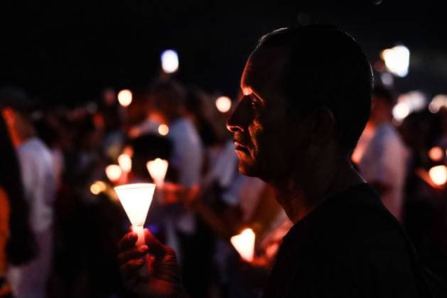 October 2, 2026, La Guaira, Venezuela (Bolivarian Republic of: LA GUAIRA, VENEZUELA, OCTOBER 2, 2026: Families of victims, survivors and rescue workers gather during the Haz de Luz vigil in La Guaira to commemorate 100 days since the devastating earthquakes of June 24. Participants lit candles and joined prayers in memory of those killed and missing, while beams of light were projected into the sky near areas heavily damaged by the disaster. The commemorative event brought together residents, volunteers and emergency workers as recovery and search efforts continue in parts of La Guaira. La Guaira Venezuela (Bolivarian Republic of - ZUMAq101 20261002_zna_q101_299 Copyright: xMarioxFloresx