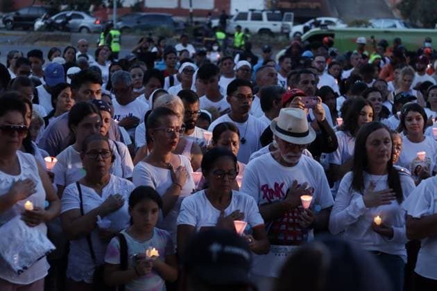 October 2, 2026, La Guaira, Venezuela (Bolivarian Republic of: LA GUAIRA, VENEZUELA, OCTOBER 2, 2026: Families of victims, survivors and rescue workers gather during the Haz de Luz vigil in La Guaira to commemorate 100 days since the devastating earthquakes of June 24. Participants lit candles and joined prayers in memory of those killed and missing, while beams of light were projected into the sky near areas heavily damaged by the disaster. The commemorative event brought together residents, volunteers and emergency workers as recovery and search efforts continue in parts of La Guaira. La Guaira Venezuela (Bolivarian Republic of - ZUMAq101 20261002_zna_q101_301 Copyright: xMarioxFloresx