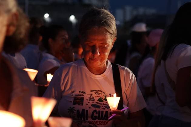 October 2, 2026, La Guaira, Venezuela (Bolivarian Republic of: LA GUAIRA, VENEZUELA, OCTOBER 2, 2026: Families of victims, survivors and rescue workers gather during the Haz de Luz vigil in La Guaira to commemorate 100 days since the devastating earthquakes of June 24. Participants lit candles and joined prayers in memory of those killed and missing, while beams of light were projected into the sky near areas heavily damaged by the disaster. The commemorative event brought together residents, volunteers and emergency workers as recovery and search efforts continue in parts of La Guaira. La Guaira Venezuela (Bolivarian Republic of - ZUMAq101 20261002_zna_q101_302 Copyright: xMarioxFloresx
