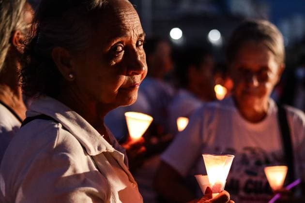 October 2, 2026, La Guaira, Venezuela (Bolivarian Republic of: LA GUAIRA, VENEZUELA, OCTOBER 2, 2026: Families of victims, survivors and rescue workers gather during the Haz de Luz vigil in La Guaira to commemorate 100 days since the devastating earthquakes of June 24. Participants lit candles and joined prayers in memory of those killed and missing, while beams of light were projected into the sky near areas heavily damaged by the disaster. The commemorative event brought together residents, volunteers and emergency workers as recovery and search efforts continue in parts of La Guaira. La Guaira Venezuela (Bolivarian Republic of - ZUMAq101 20261002_zna_q101_304 Copyright: xMarioxFloresx