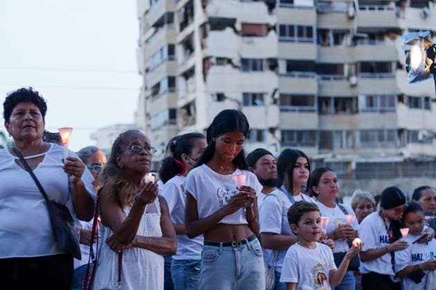 October 2, 2026, La Guaira, Venezuela (Bolivarian Republic of: LA GUAIRA, VENEZUELA, OCTOBER 2, 2026: Families of victims, survivors and rescue workers gather during the Haz de Luz vigil in La Guaira to commemorate 100 days since the devastating earthquakes of June 24. Participants lit candles and joined prayers in memory of those killed and missing, while beams of light were projected into the sky near areas heavily damaged by the disaster. The commemorative event brought together residents, volunteers and emergency workers as recovery and search efforts continue in parts of La Guaira. La Guaira Venezuela (Bolivarian Republic of - ZUMAq101 20261002_zna_q101_306 Copyright: xMarioxFloresx
