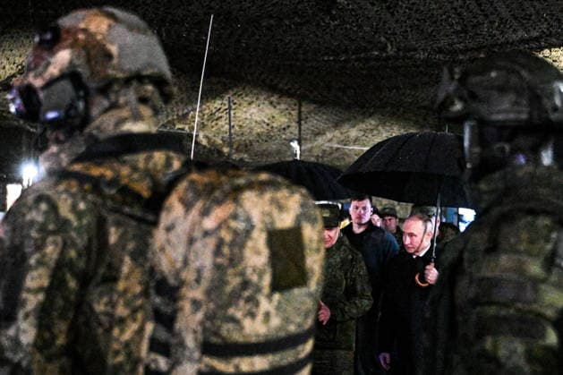 RUSSIA, CHELYABINSK REGION - OCTOBER 2, 2026: Russia s President Vladimir (R) Putin inspects the Tsentr Centre 2026 military exercise at the Chebarkul training ground. Sergei Bobylev POOL TASS  98707464