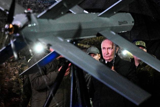 RUSSIA, CHELYABINSK REGION - OCTOBER 2, 2026: Russia s President Vladimir Putin inspects the Tsentr Centre 2026 military exercise at the Chebarkul training ground. Sergei Bobylev POOL TASS  98707465