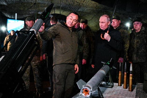 RUSSIA, CHELYABINSK REGION - OCTOBER 2, 2026: Russia s President Vladimir Putin (3rd R) inspects the Tsentr Centre 2026 military exercise at the Chebarkul training ground. Sergei Bobylev POOL TASS  98707471