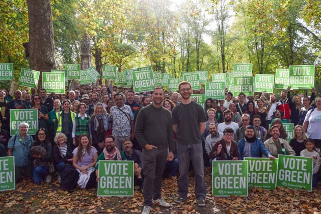 October 3, 2026, London, England, United Kingdom: Green Party leader ZACK POLANSKI and co-leader of the Scottish Green Party ROSS GREER stand with supporters in St Pancras Gardens as Zack Polanski continues his campaign ahead of the upcoming Holborn and St Pancras by-election. London United Kingdom - ZUMAv130 20261003_zip_v130_008 Copyright: xVukxValcicx