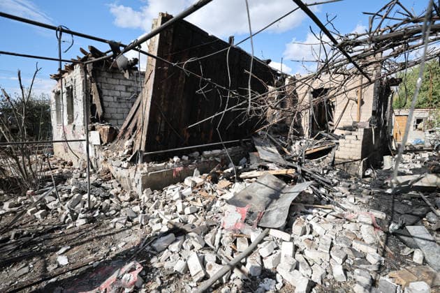 RUSSIA, DONETSK - OCTOBER 3, 2026: A house suffers damage from a drone strike on Donetsk s Kiyevsky District. Dmitry Yagodkin TASS  98712015