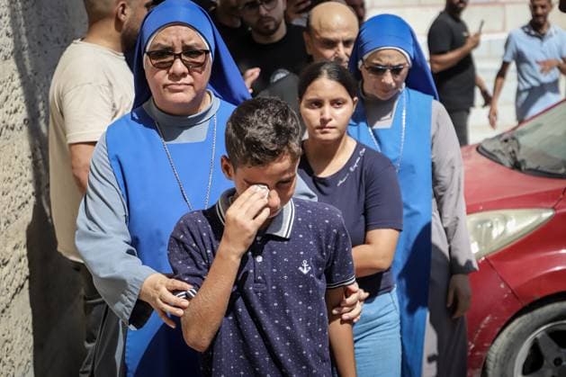 RECORD DATE NOT STATED Funeral Held for Christian Mother and Daughter Killed in Gaza City Strike (INT) Funeral Held for Christian Mother and Daughter Killed in Gaza City Strike on October 3, 2026, Gaza, Palestine: Mourners attend the funeral of Christian mother Maysa Abu Dawood and her daughter Mary at Saint Porphyrius Church in Gaza City on Saturday, after they were killed early in the morning when an Israeli airstrike hit their residential apartment in the city. Mukhtars, community reconciliation figures, and members of the Palestinian Civil Defense attend the funeral. Credit: Mohammed M. Skaik TheNews2(Foto: Mohammed Skaik Thenews2 imago images) Funeral Held for Christian Mother and Daughter Killed in Gaza City Strike  Copyright: xMohammedxSkaikx