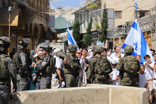 Israeli forces raid Hebron on Sukkot holiday HEBRON, WEST BANK, PALESTINE - OCTOBER 03: Israeli soldiers restrict the movement of Palestinians and take security measures as they raid the Old Town on the occasion of Sukkot feast in Hebron, West Bank, Palestine on October 03, 2026. Amer Shallodi Anadolu Hebron West Bank. Editorial use only. Please get in touch for any other usage.  Copyright: x2026xAnadoluxAmerxShallodix