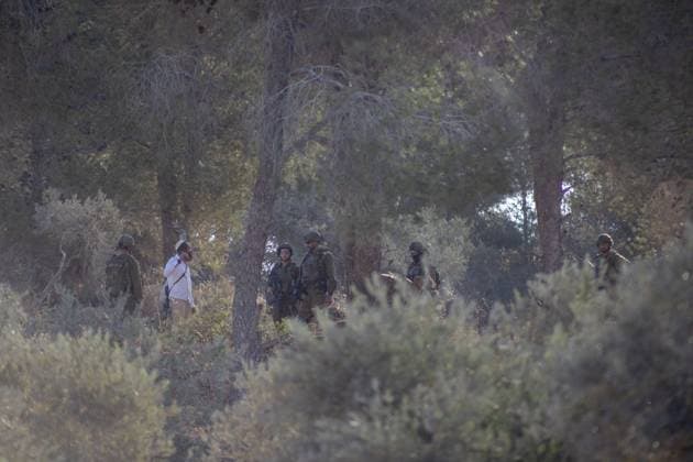 Israeli Forces Arrested Palestinian Farmers Attempting To Harvest Olives Near Beita JABAL KAMAS, BEITA, PALESTINE OCTOBER 3, 2026: Israeli forces arrested seven Palestinian residents who were attempting to harvest their land in Jabal Kamas, near Beita. According to the provided information, nearly 20 Israeli settlers from the Mevaser Hashalom outpost, also known as Herald of Peace, attacked the farmers as they began working, while Israeli soldiers opened live fire. The military later arrested seven Palestinian residents and declared the area a closed military zone. The incident occurred as Palestinian farmers attempted to access and harvest their agricultural land near Beita. Nablus PS Copyright: x xRomanxLevinx xJNAxPressx