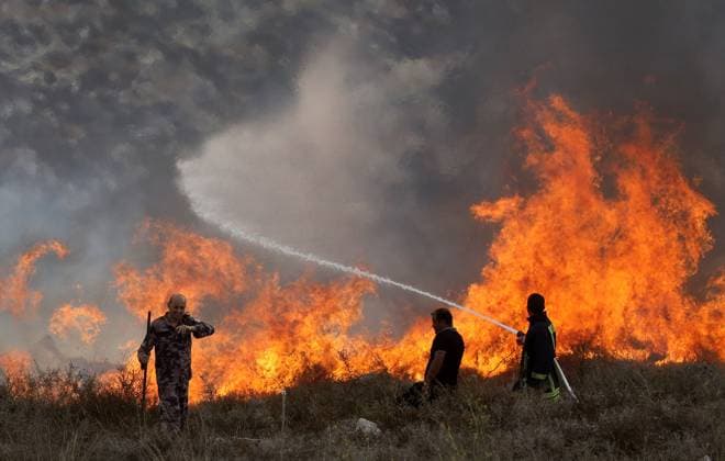 Palestinian Farmers and Civil Defense Extinguish Fire in Asira al-Qibliya ASIRA AL-QIBLIYA, PALESTINE OCTOBER 3, 2026: Palestinian farmers and civil defense personnel extinguished a fire in agricultural fields in Asira al-Qibliya village, south of Nablus, after Israeli army forces fired tear gas in the area. Israeli forces had prevented Palestinians from harvesting olives. Nablus Palestine, State of Copyright: x xNedalxShtiehx xJNAxPressx
