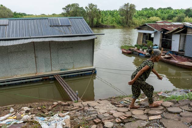 Floating homes offer a way of life adapted to recurrent flooding in Hanoi HANOI, VIETNAM - OCTOBER 3: Residents go about their daily lives in a floating village built in an area that is regularly affected by flooding, with homes designed to rise with changing water levels, as seen in Hanoi, Vietnam, on October 3, 2026. The floating homes allow residents to adapt to recurring floods while continuing to live and work in the area. Magdalena Chodownik Anadolu Hanoi Vietnam. Editorial use only. Please get in touch for any other usage.  Copyright: x2026xAnadoluxMagdalenaxChodownikx