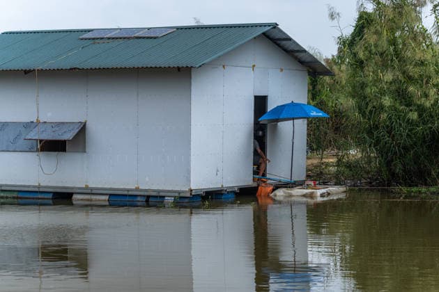 Floating homes offer a way of life adapted to recurrent flooding in Hanoi HANOI, VIETNAM - OCTOBER 3: Residents go about their daily lives in a floating village built in an area that is regularly affected by flooding, with homes designed to rise with changing water levels, as seen in Hanoi, Vietnam, on October 3, 2026. The floating homes allow residents to adapt to recurring floods while continuing to live and work in the area. Magdalena Chodownik Anadolu Hanoi Vietnam. Editorial use only. Please get in touch for any other usage.  Copyright: x2026xAnadoluxMagdalenaxChodownikx