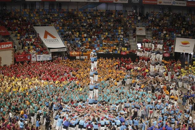Human tower groups perform in the 30th Concurs de Castells competition in Tarragona TARRAGONA, SPAIN - OCTOBER 3: Members of human tower groups (colles) build intricate human towers (castells) during the competition section of the 30th Concurs de Castells at the Tarraco Arena Placa in Tarragona, Spain on October 3, 2026. The biennial event, recognized as UNESCO Intangible Cultural Heritage, gathers top teams from across Catalonia to construct towering multi-tiered human structures. Senhan Bolelli Anadolu Tarragona Spain. Editorial use only. Please get in touch for any other usage.  Copyright: x2026xAnadoluxSenhanxBolellix