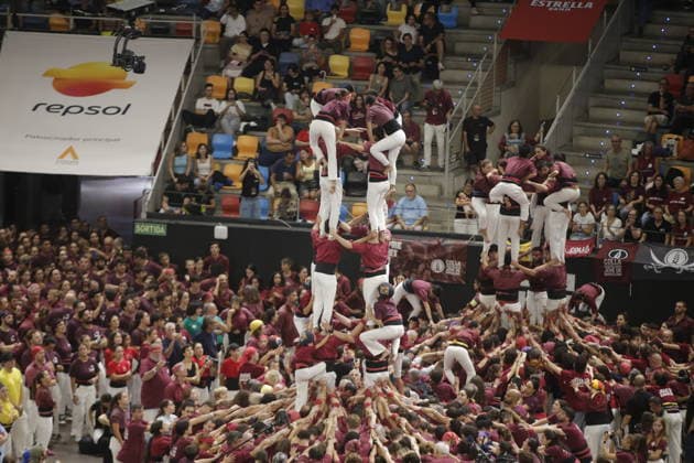 Human tower groups perform in the 30th Concurs de Castells competition in Tarragona TARRAGONA, SPAIN - OCTOBER 3: Members of human tower groups (colles) build intricate human towers (castells) during the competition section of the 30th Concurs de Castells at the Tarraco Arena Placa in Tarragona, Spain on October 3, 2026. The biennial event, recognized as UNESCO Intangible Cultural Heritage, gathers top teams from across Catalonia to construct towering multi-tiered human structures. Senhan Bolelli Anadolu Tarragona Spain. Editorial use only. Please get in touch for any other usage.  Copyright: x2026xAnadoluxSenhanxBolellix