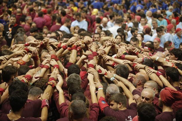 Human tower groups perform in the 30th Concurs de Castells competition in Tarragona TARRAGONA, SPAIN - OCTOBER 3: Members of human tower groups (colles) build intricate human towers (castells) during the competition section of the 30th Concurs de Castells at the Tarraco Arena Placa in Tarragona, Spain on October 3, 2026. The biennial event, recognized as UNESCO Intangible Cultural Heritage, gathers top teams from across Catalonia to construct towering multi-tiered human structures. Senhan Bolelli Anadolu Tarragona Spain. Editorial use only. Please get in touch for any other usage.  Copyright: x2026xAnadoluxSenhanxBolellix