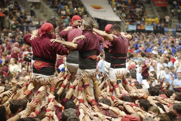 Human tower groups perform in the 30th Concurs de Castells competition in Tarragona TARRAGONA, SPAIN - OCTOBER 3: Members of human tower groups (colles) build intricate human towers (castells) during the competition section of the 30th Concurs de Castells at the Tarraco Arena Placa in Tarragona, Spain on October 3, 2026. The biennial event, recognized as UNESCO Intangible Cultural Heritage, gathers top teams from across Catalonia to construct towering multi-tiered human structures. Senhan Bolelli Anadolu Tarragona Spain. Editorial use only. Please get in touch for any other usage.  Copyright: x2026xAnadoluxSenhanxBolellix