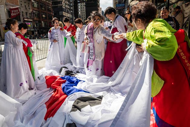 October 3, 2026, New York, New York, USA: 2026 NYC Korean Parade participants get their flags and outfits ready before it starts. New York USA - ZUMAh214 20261003_znp_h214_009 Copyright: xSDxHerzogx