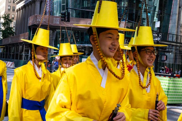 October 3, 2026, New York, New York, USA: 2026 NYC Korean Parade participants walk by in brightly colored yellow outfits. New York USA - ZUMAh214 20261003_znp_h214_016 Copyright: xSDxHerzogx
